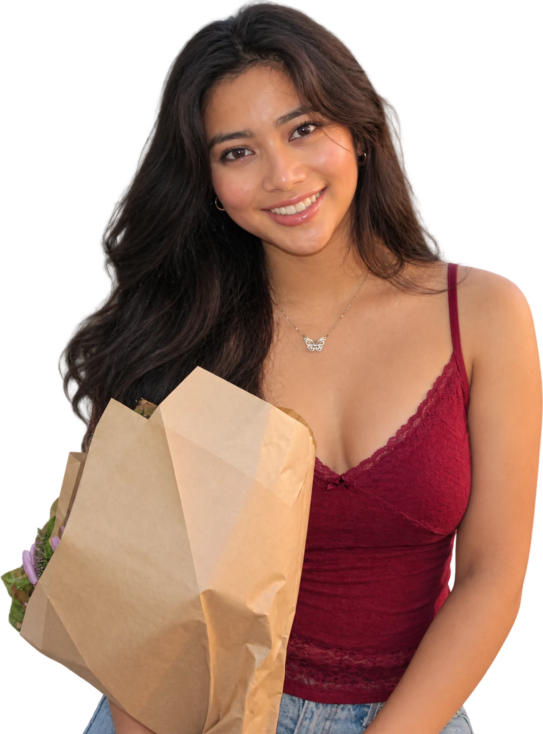 Bethany smiling in a burgundy dress and holding flowers